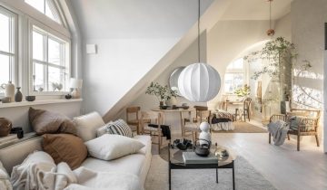 A Light and Airy Open-Plan Swedish Loft with Angled Ceilings