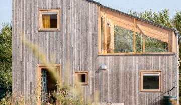 Timber structure defines Sprout Ruben & Marjolein home by Woonpioniers