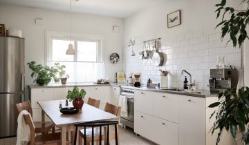 A White Swedish Apartment with Lovely Outdoor Lounge Area