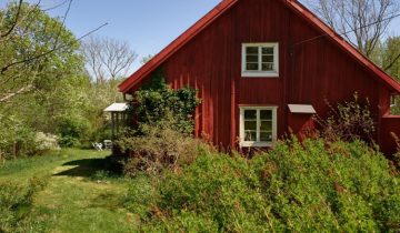 A Charming, Traditional Red and White Swedish Summer Cottage