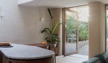 Sonn uses rough plaster finishes for “sculptural” London extension