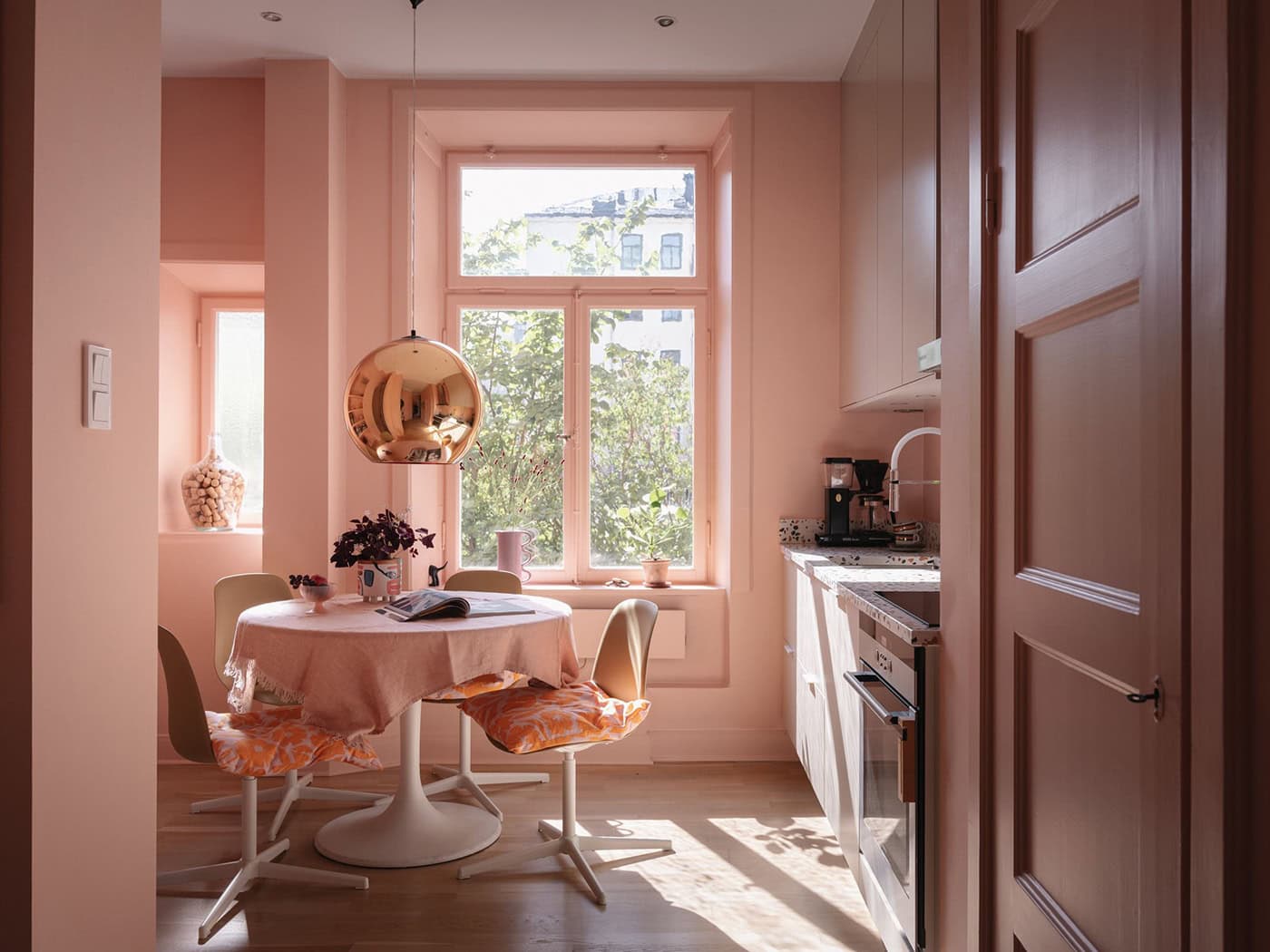 Off White Kitchen Cabinets Paired With A Terrazzo Countertop And Pink Walls4.jpg