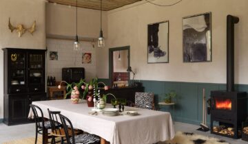 A Swedish villa with green wainscoting and an eclectic style