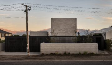 Roberts Gray Architects wraps SKI House with charred timber