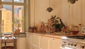 Golden Light and Design Pieces in a Swedish Apartment